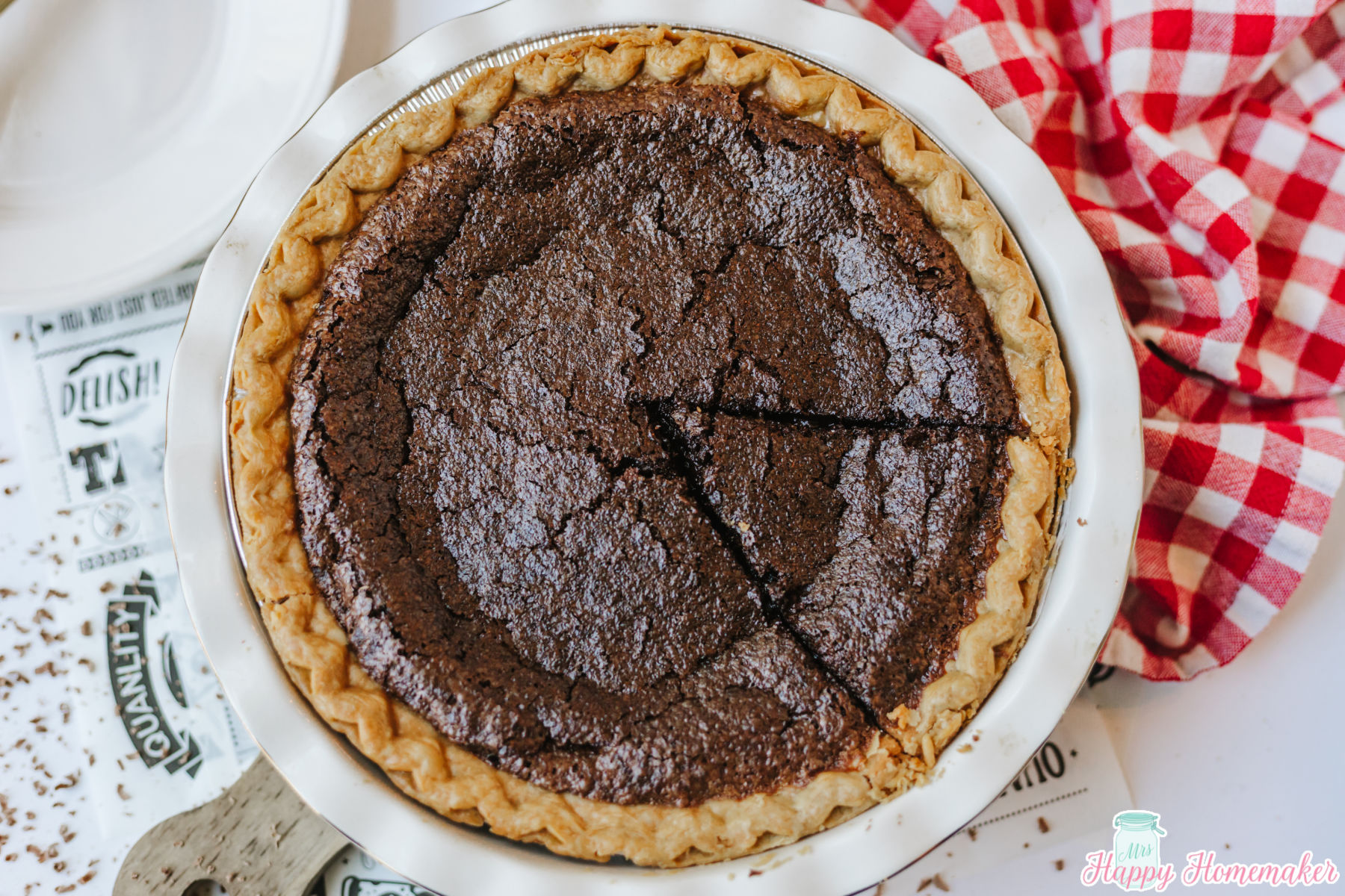 Chocolate Fudge Pie with a slice cut in the pie