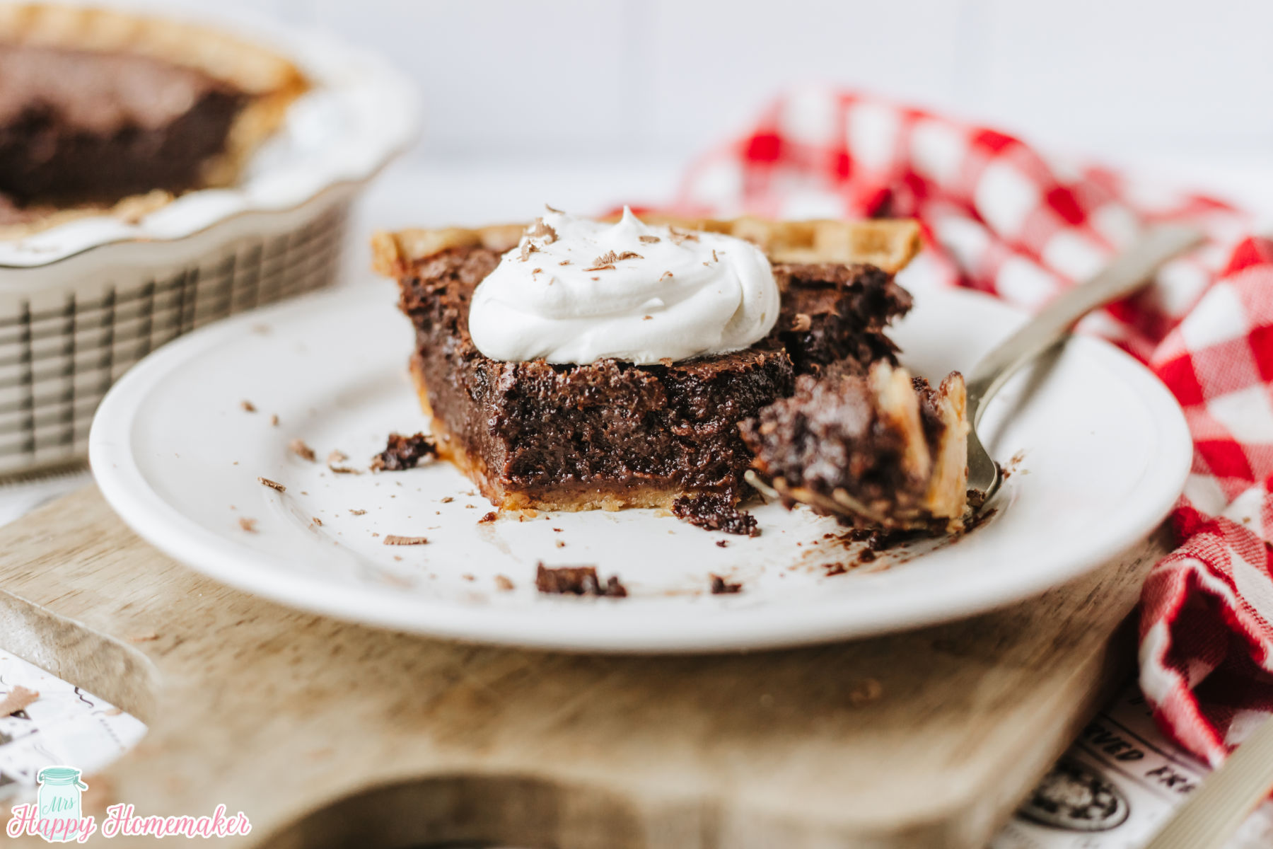 Chocolate Fudge Pie slice on a white plate