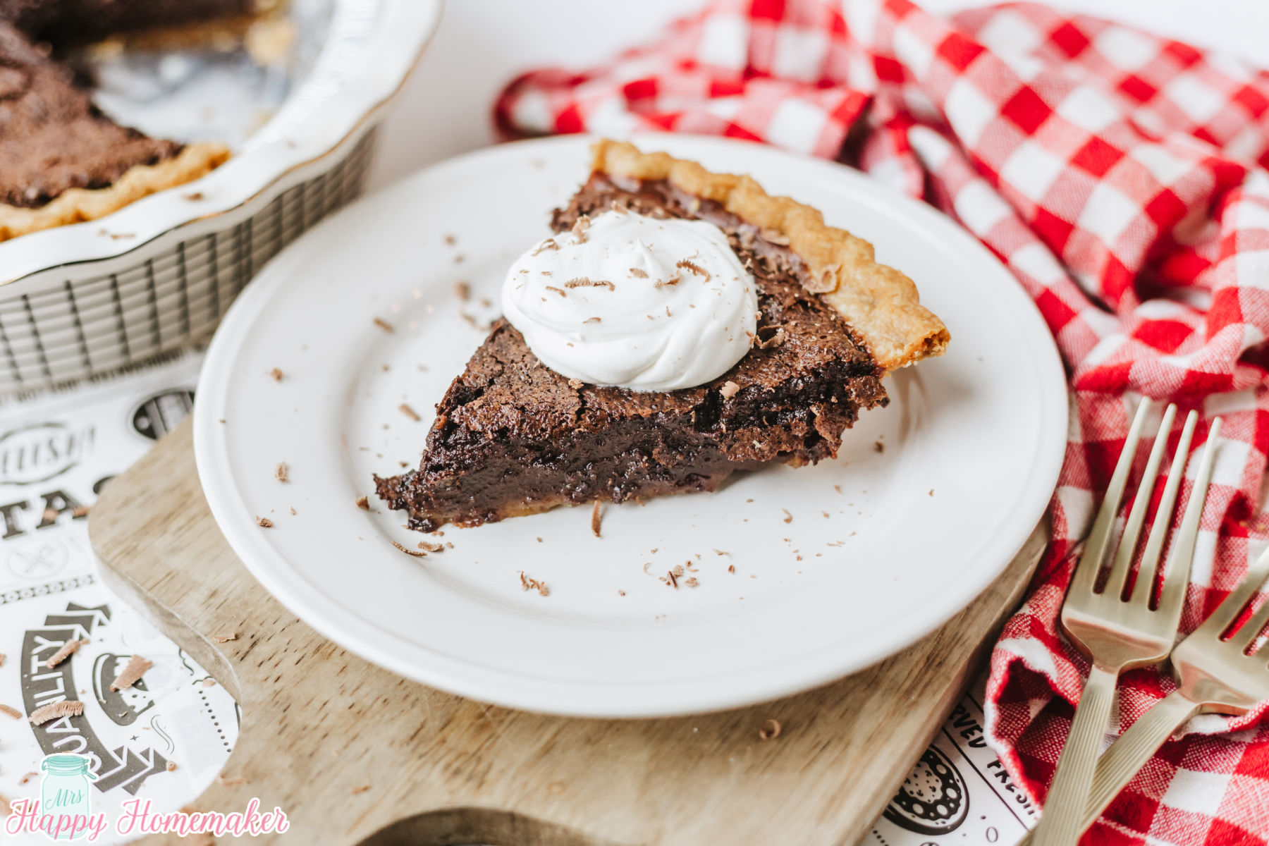 Chocolate Fudge Pie slice on a white plate