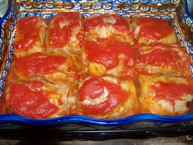 Cabbage rolls in a blue 9x13 baking dish