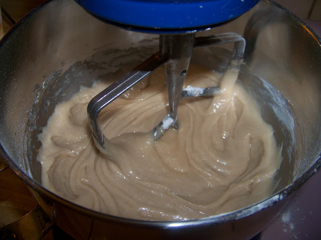 cake batter in a bowl being mixed 