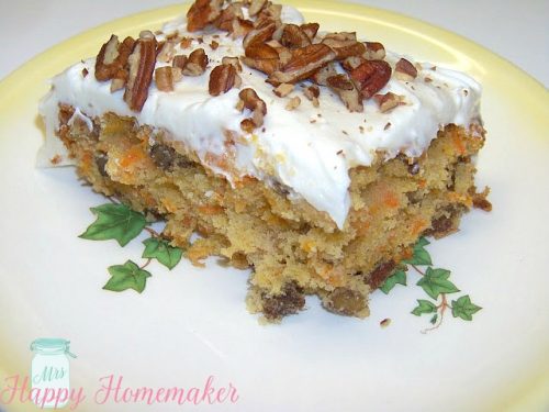 sliced Carrot Cake with pecans on top