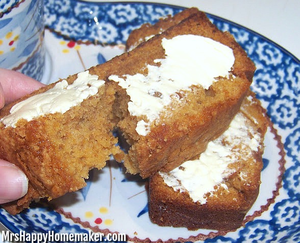Sweet Potato Bread with butter on top, sitting on a blue plate