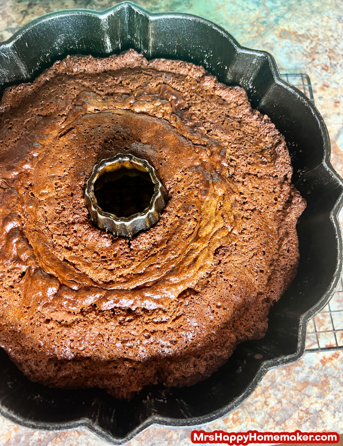 German chocolate pound cake in a bundt pan on a granite countertop 