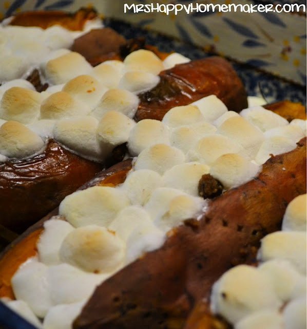 Twice baked stuffed sweet potatoes - stuffed with marshmallows and lined up on a baking sheet