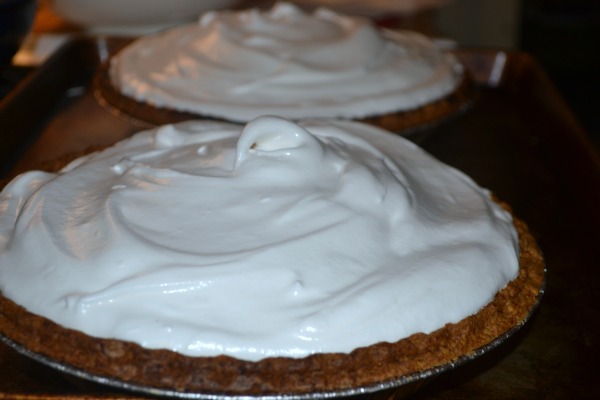 Sweet Potato Coconut Pie with Marshmallow Meringue - this recipe will take your traditional sweet potato pie to a whole new level. Everyone will rave & ask you for the recipe... and it's pretty to look at too! | MrsHappyHomemaker.com @thathousewife