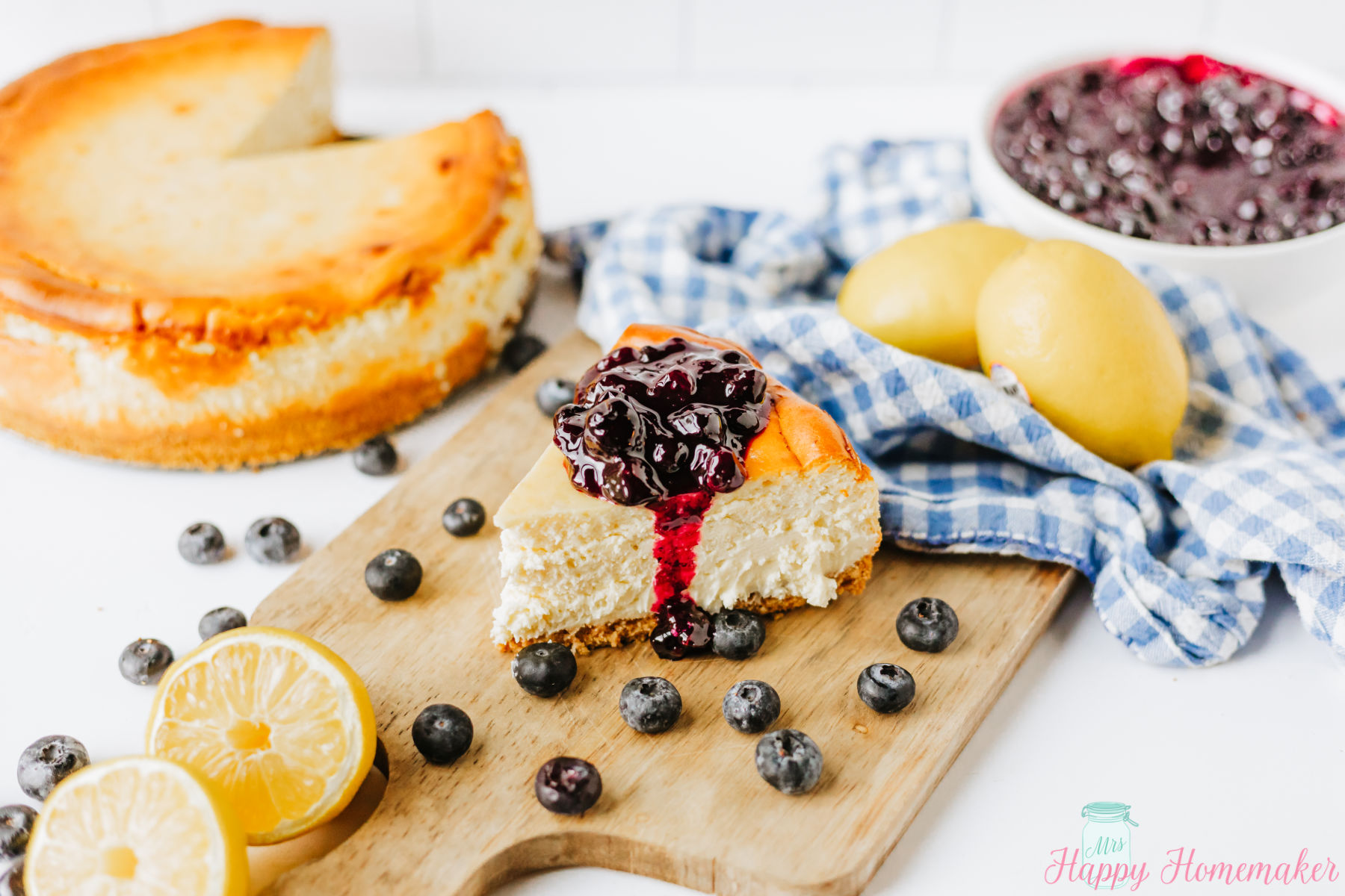 Lemon Cheesecake slice on a cutting board