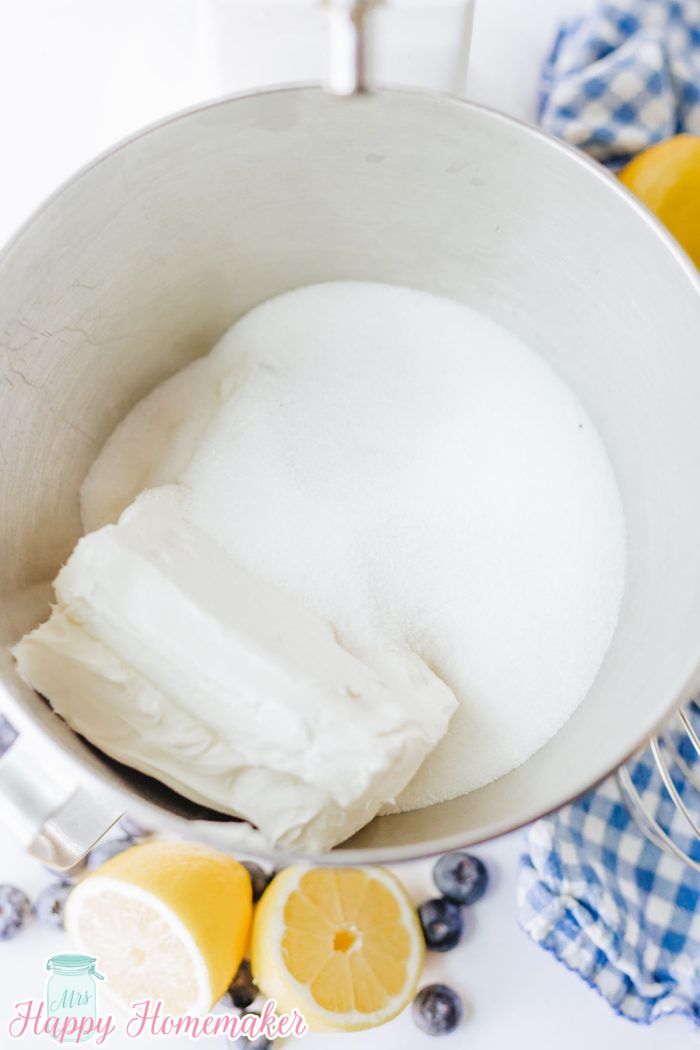 cream cheese and heavy cream in a bowl