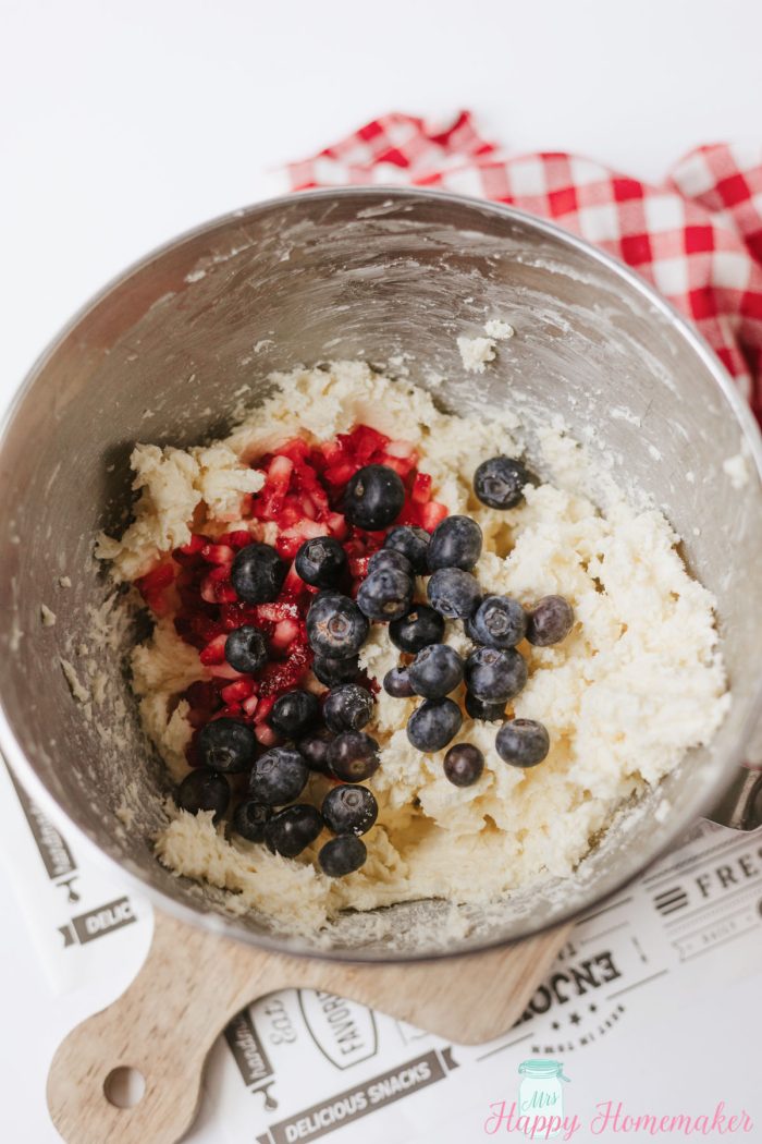 butter and berries in a stainless steel bowl