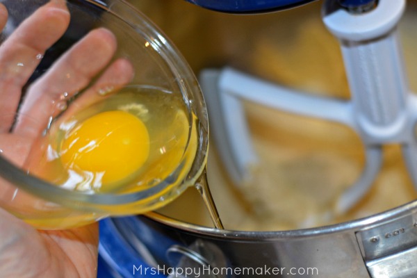 egg being poured into a bowl