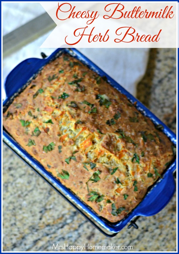 Cheesy Buttermilk Herb Bread in a blue loaf pan 