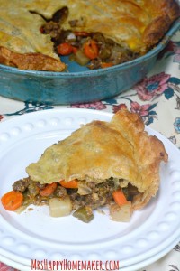 This Beef Puff Pie recipe has been a family favorite for many years now. Beef & veggies simmered in a secret ingredient then encased in a puff pastry crust. ABSOLUTELY DELICIOUS!! | MrsHappyHomemaker.com @MrsHappyHomemaker