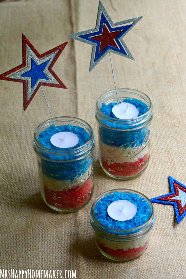 Looking for a fast & easy centerpiece for your 4th of July or Memorial Day table? These simple Red, White, & Blue Rice Candles (yes made out of rice!) are right up your alley! | MrsHappyHomemaker.com