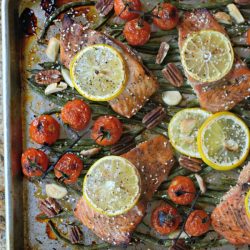 Ginger Teriyaki Salmon & Green Beans, with roasted tomatoes, lemon, garlic, & pecans, all cooked together in unity in this super simple one sheet pan meal! DELICIOUS! | Get the recipe at MrsHappyHomemaker.com
