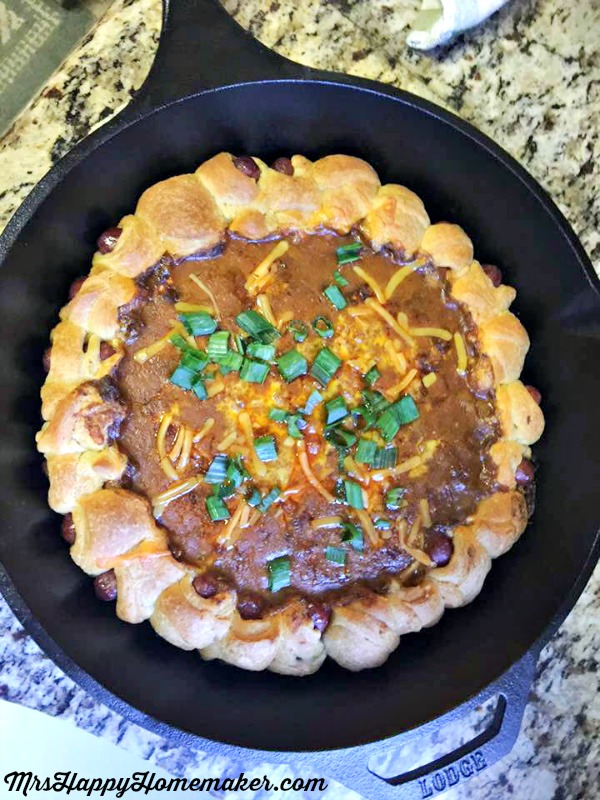 Chili Cheese Pig in the Blanket Dip in a cast iron skillet