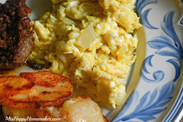 I never liked scrambled eggs before trying this recipe for Grandma Lynne's Eggs & Onions. Now, I can't get enough! Bonus points - you only need 3 ingredients (not counting salt & pepper!). | MrsHappyHomemaker.com @thathousewife