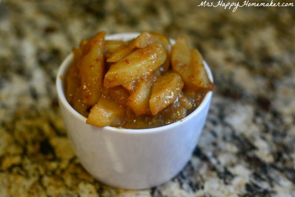Crockpot Caramel Baked Apples in a white bowl