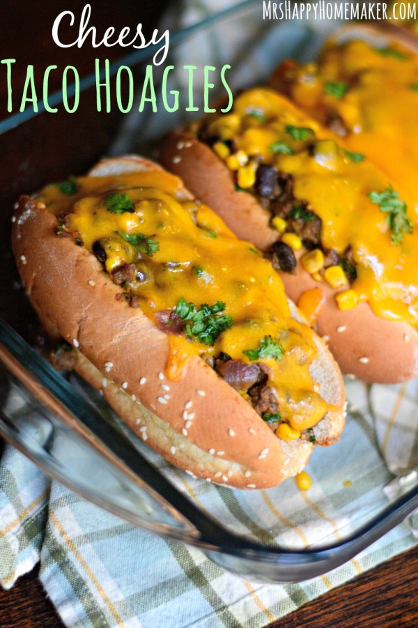 Cheesy Taco Hoagies – the most perfect (and I do mean perfect) taco filling piled high in a hoagie roll, generously topped with cheddar cheese, & baked. The ultimate easy weeknight meal! 
