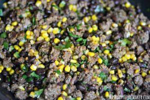 taco meat mixture with ground beef, black beans, corn and cilantro