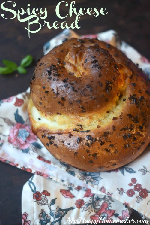 Spicy Cheese Bread - speckled with red pepper flakes, stuffed with 2 kinds of cheese, rolled into a giant swirl, & baked to perfection