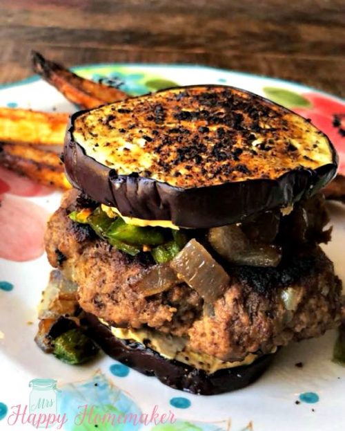 This SPICY JALAPENO BURGER with a garlic crusted eggplant bun has been the recipe to get me through my burger cravings during my Whole30 reset… and to be completely honest, I don’t even miss the bun at all. Since their is no bun, obviously it’s low carb, gluten & grain free. It’s SO good. Like really, truly GOOD. Perfect for anyone trying to eat healthier (or doing paleo, keto, etc) while not wanting to sacrifice flavor. | MrsHappyHomemaker.com