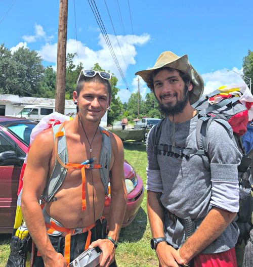 two hikers with hiking gear - Pete Miljevic and Tyler Bidwell