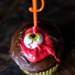 Bloody 'Knife in the Eyeball' Cupcakes
