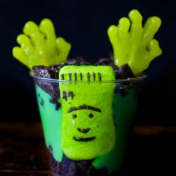 Zombie Pudding Cups with candy hands