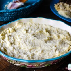 Creamy Mashed Potatoes in a pretty light blue rimmed floral dish