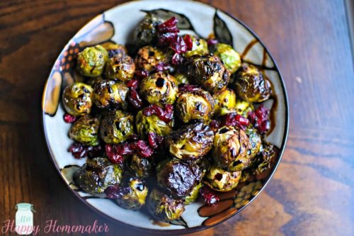 Balsamic Cranberry Roasted Brussel Sprouts - roasted to perfection & drizzled with a balsamic glaze & dried cranberries | MrsHappyHomemaker.com