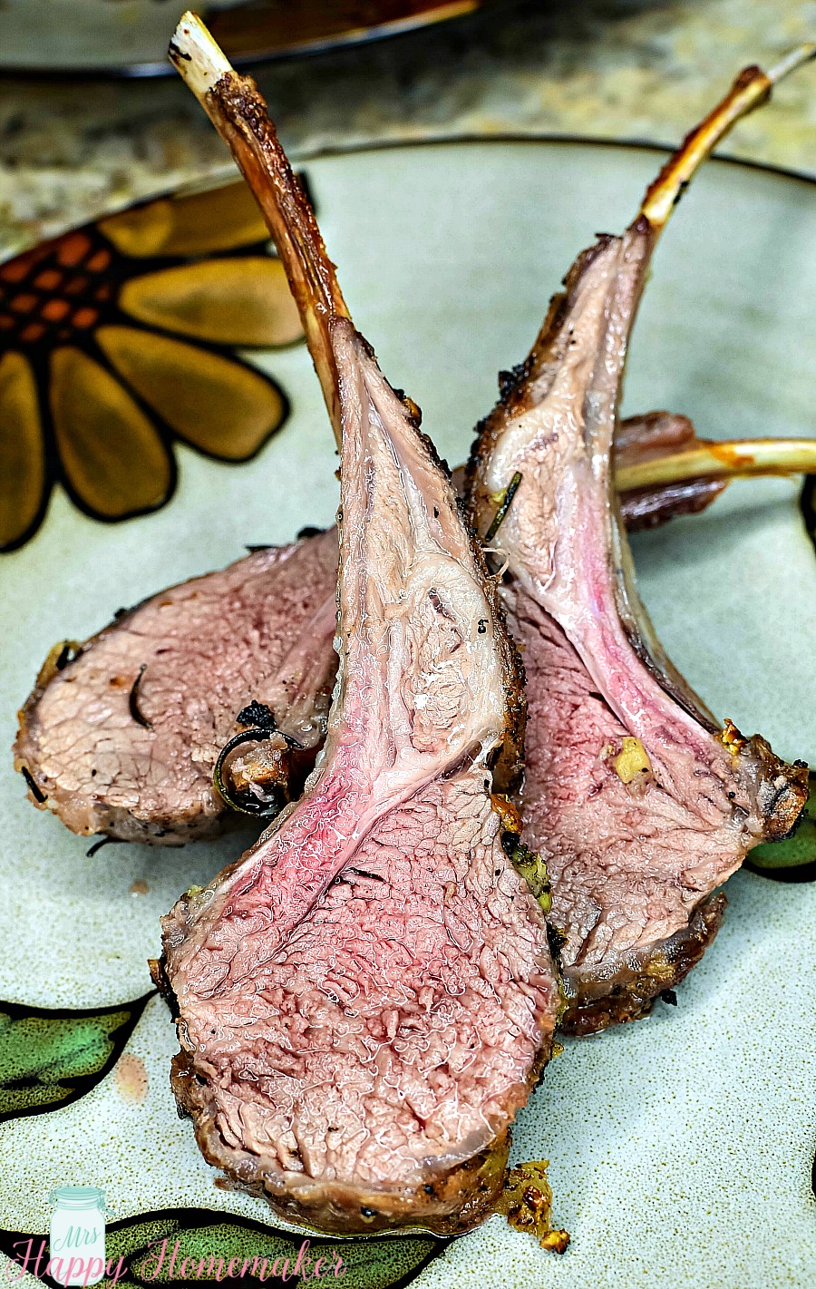 Roasted Rack of Lamb - 3 pieces on a plate 
