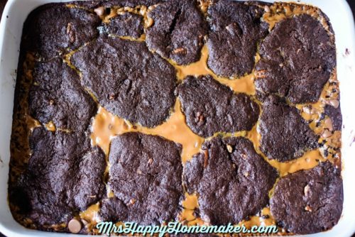 Double Caramel Turtle Brownies in a rectangle white pan