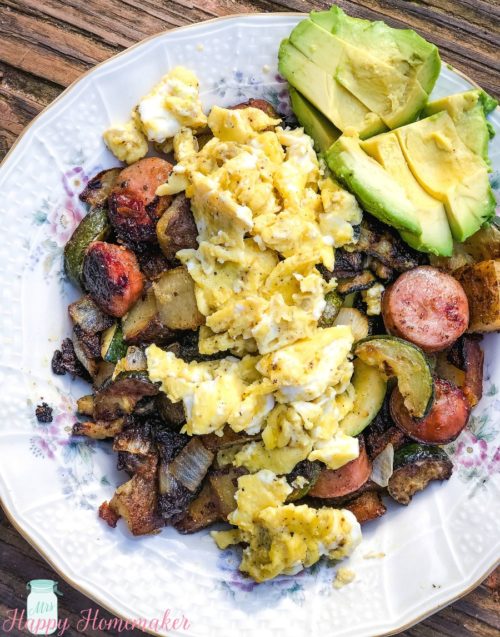 Chicken Sausage and Veggie Breakfast Hash with sliced avocado and eggs | MrsHappyHomemaker.com