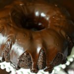 Chocolate Overboard Bundt Cake - the easiest, richest, most decadent (but still simple!) chocolate cake I have ever made... and it starts with a cake mix! | MrsHappyHomemaker.com