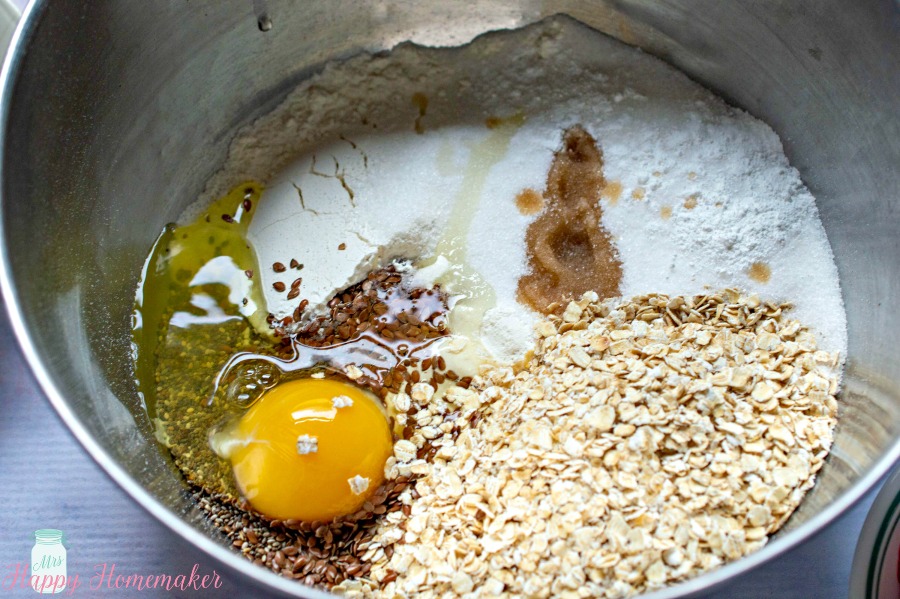 Berry Chia Bars ingredients being mixed in a bowl 