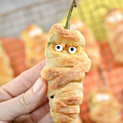 Jalapeno Popper Mummies - jalapeños stuffed with cheese and wrapped in refrigerated dough strips to resemble mummy wrappings.