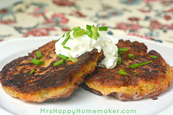Zucchini Fritters with sour cream and green onions