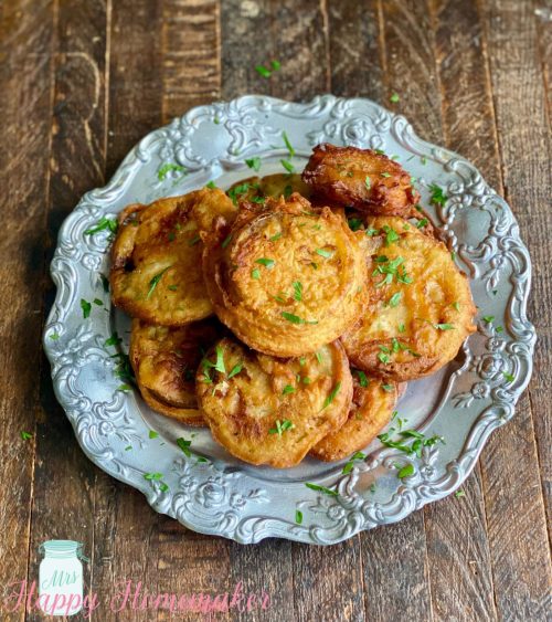 Fried green tomatoes on silver plate