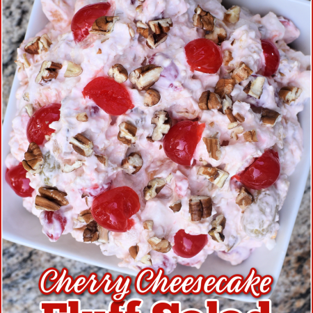 Cherry Cheesecake Fluff Salad in a square white bowl on a granite counter