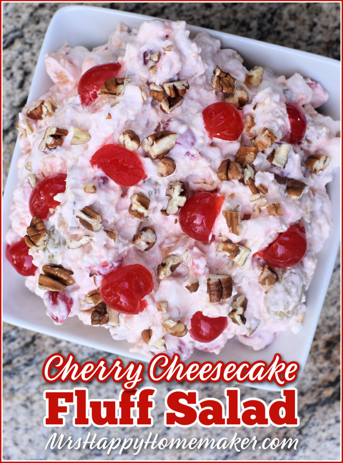 Cherry Cheesecake Fluff Salad in a square white bowl on a granite counter 