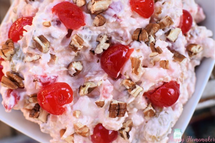 Cherry Cheesecake Fluff Salad in a square white bowl 