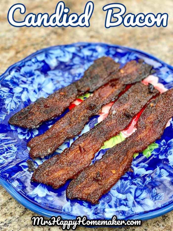 4 pieces of candied bacon on a blue plate 