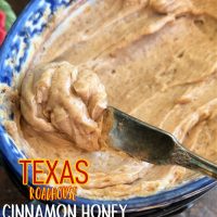 Texas Roadhouse butter - cinnamon honey butter, in a blue dish with a butter knife