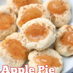 Easy apple pie thumbprint cookies on a white plate with a striped tablecloth underneath