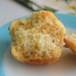 Cracked Pepper Cheddar Muffins on a blue rimmed plate