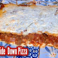 Upside down pizza in a blue casserole dish