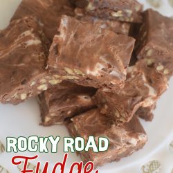 Rocky road fudge on a white milk glass plate