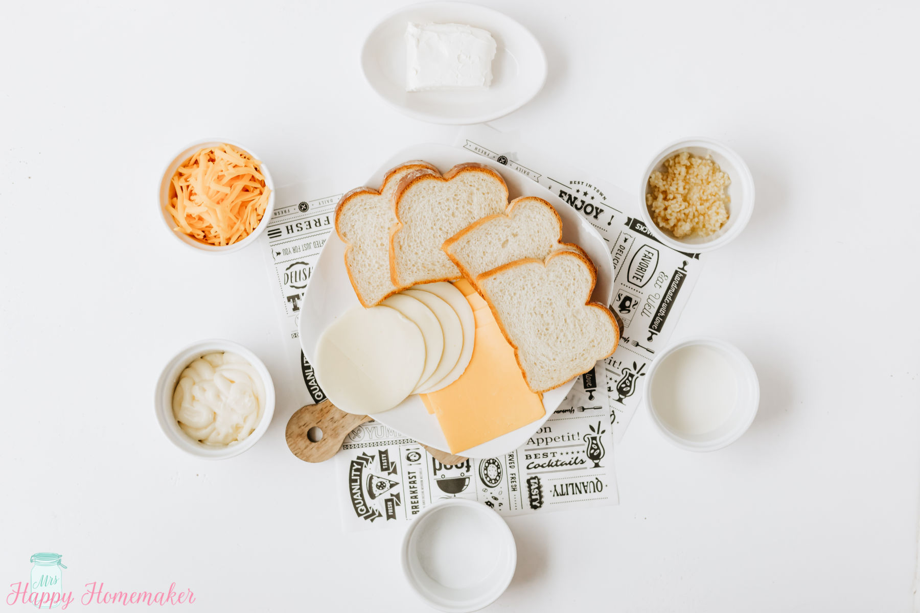 ingredients for disneyland grilled cheese laid out on a white countertop