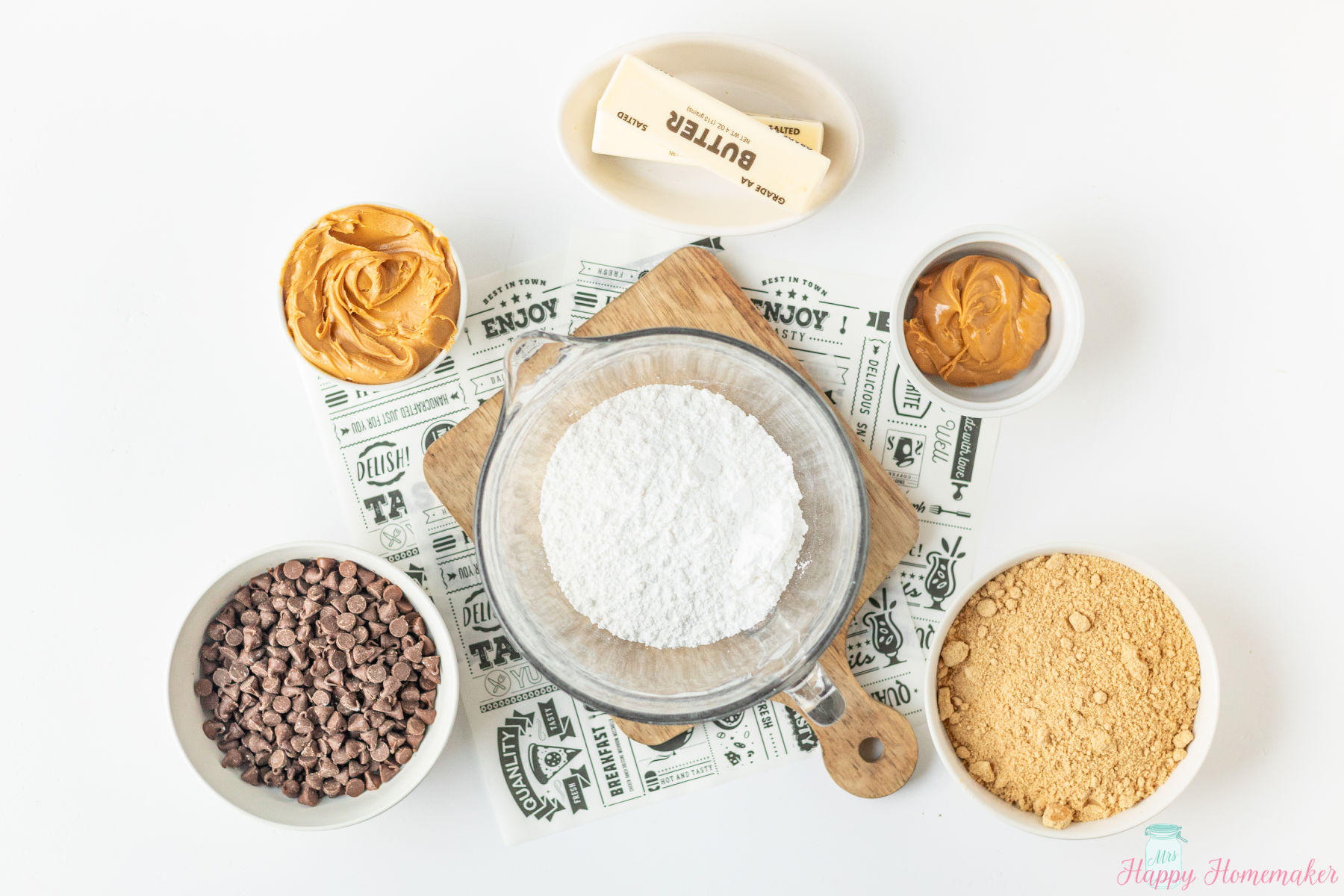 No Bake Lunch Lady peanut butter bars ingredients laid out in small bowls on a white counter