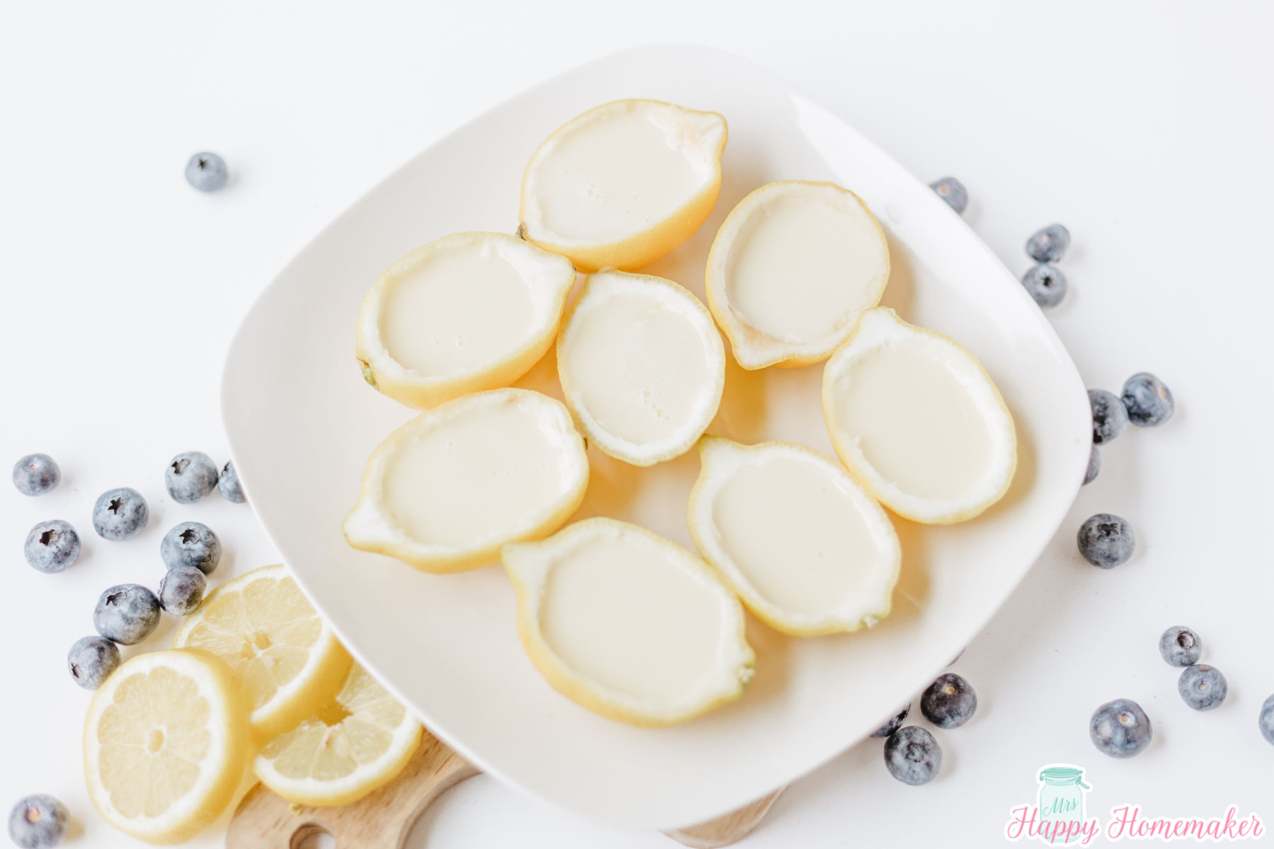 Lemon Posset on a white square plate